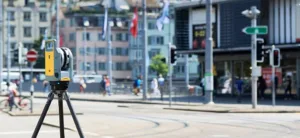 3D laser scanner capturing survey data in an urban street
