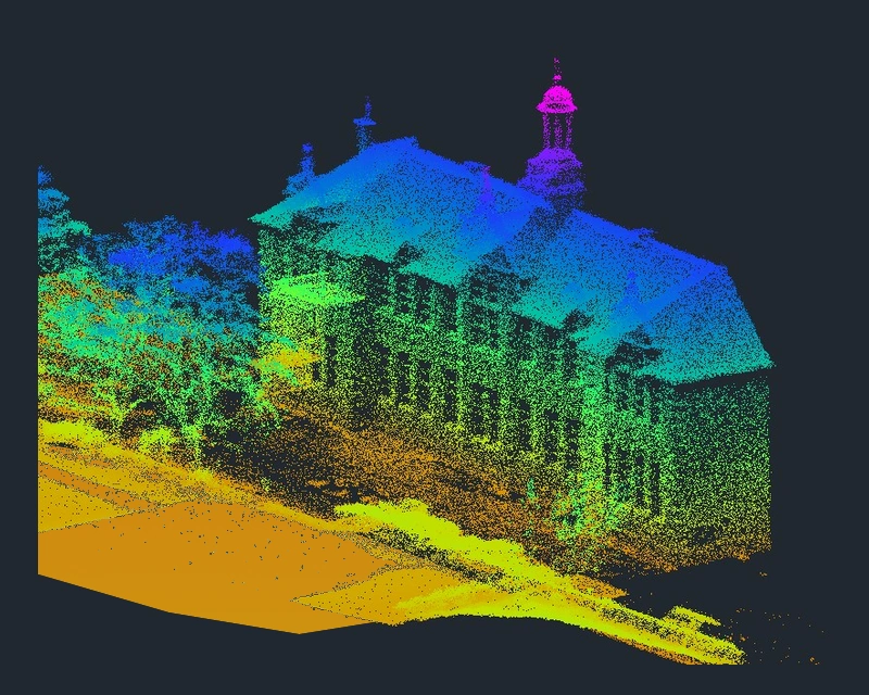 False-colour 3D point cloud data showing a surveyed building, surrounding land, trees and road surface.