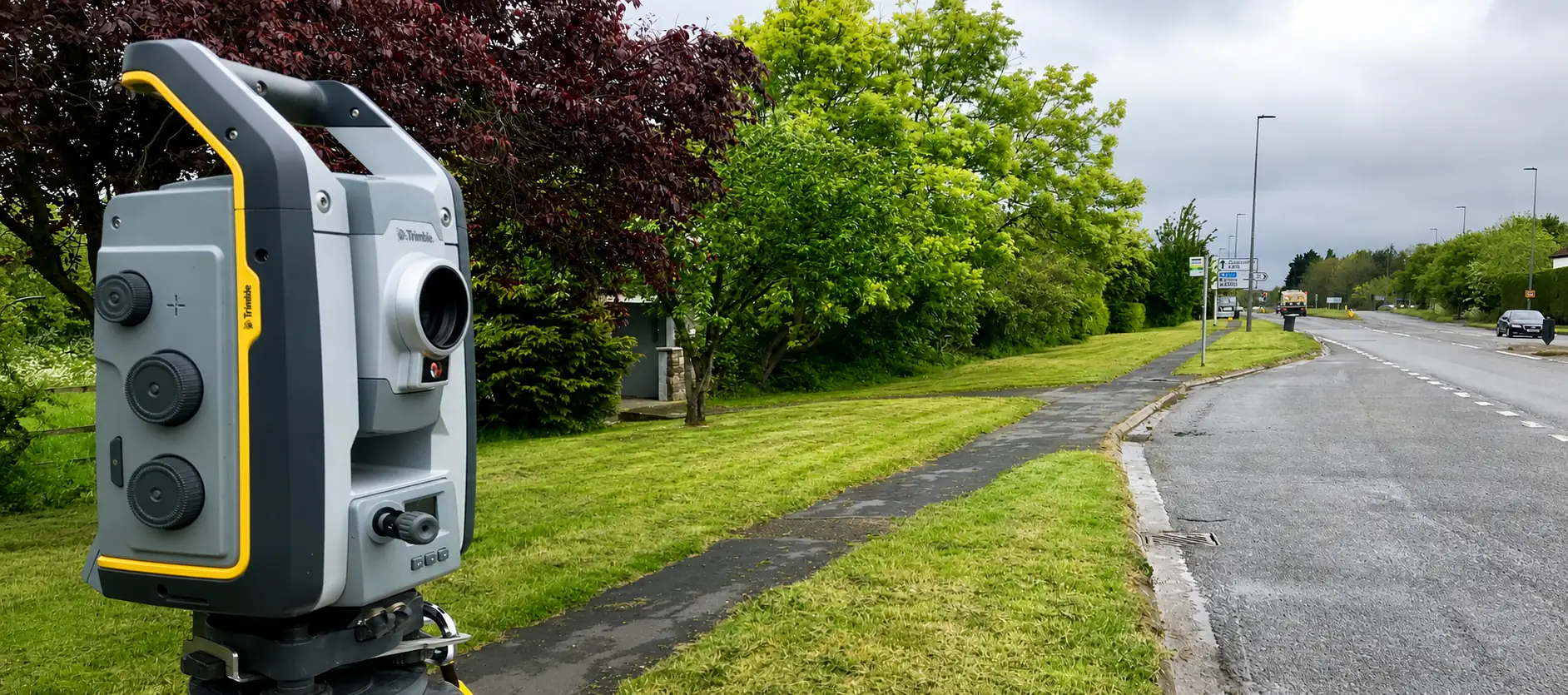 Trimble total station set up beside a road for a highway survey in South Gloucestershire