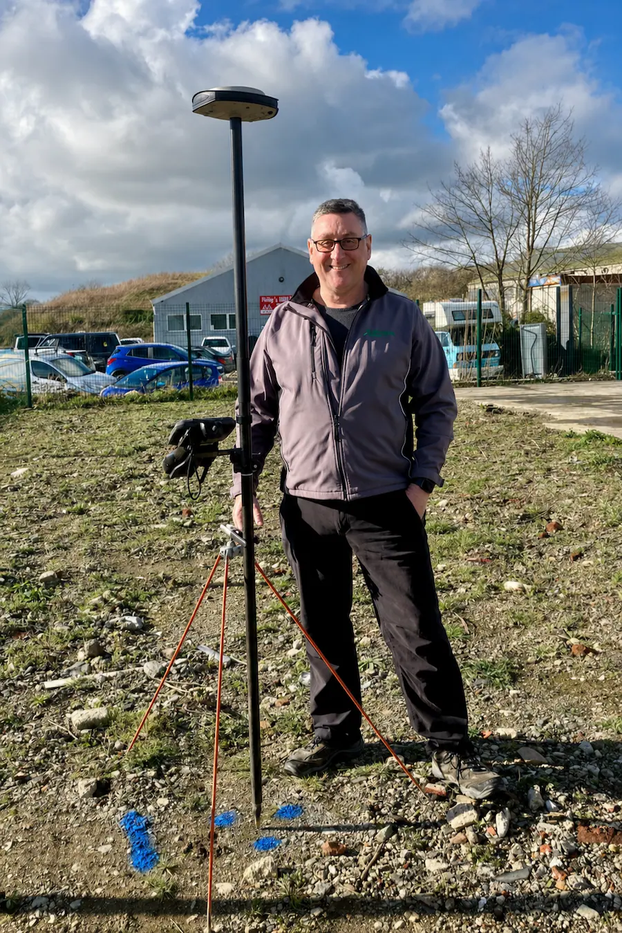 Neil Moloney of Pinpoint Mapping working on a topographical survey