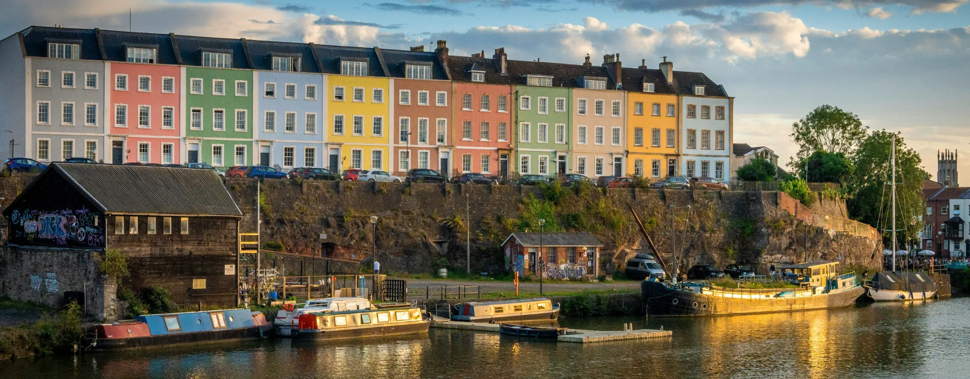 Land surveys Bristol – Bristol Harbour waterfront with colourful houses and boats