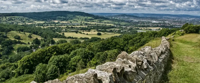 Land Surveys Cotswolds overlooking the Cotswold countryside and traditional stone wall